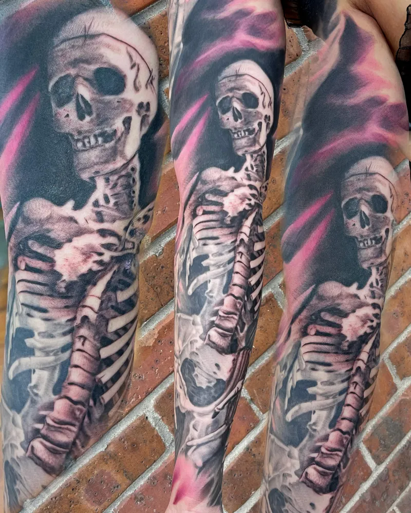 Color skeleton sleeve with an exposed ribcage and spine against pink and orange flames, shown from three angles