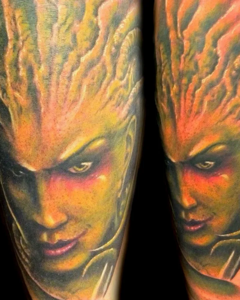 Color realistic tattoo of a molten, fiery humanoid face, shown from two angles on the forearm